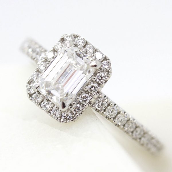 emerald cut diamond halo engagement ring