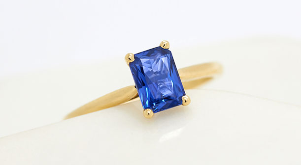 blue sapphire radiant cut yellow gold solitaire engagement ring
