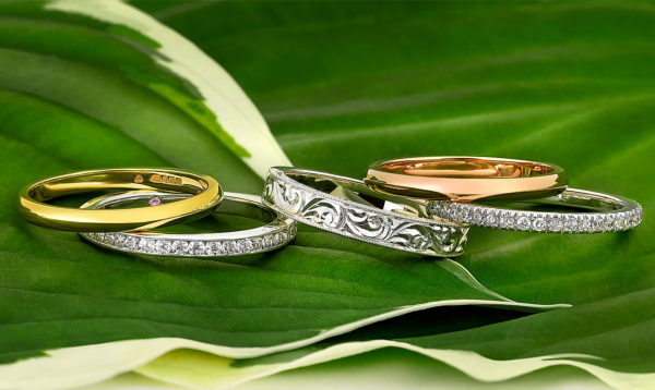Engraved platinum, rose gold, yellow gold wedding bands