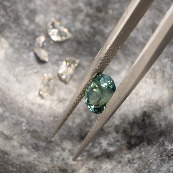 Loose green sapphire and diamonds